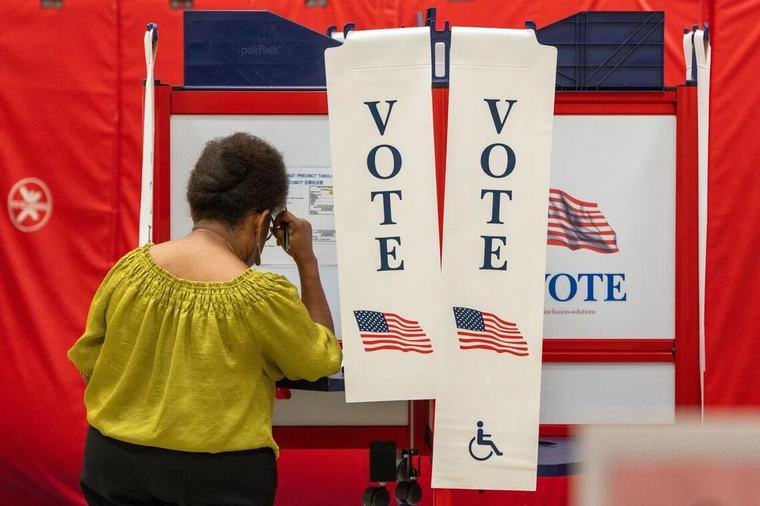 US midterm elections begin with chaos over mail-in voting crackdown