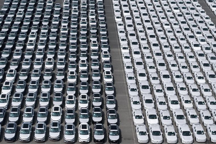 China tells carmakers to keep price war away from export markets