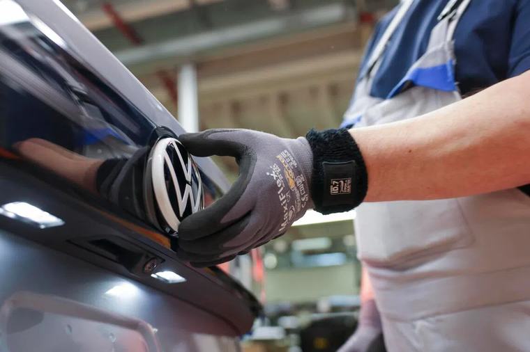 Car giant Volkswagen says cutting 100,000 jobs by end of decade