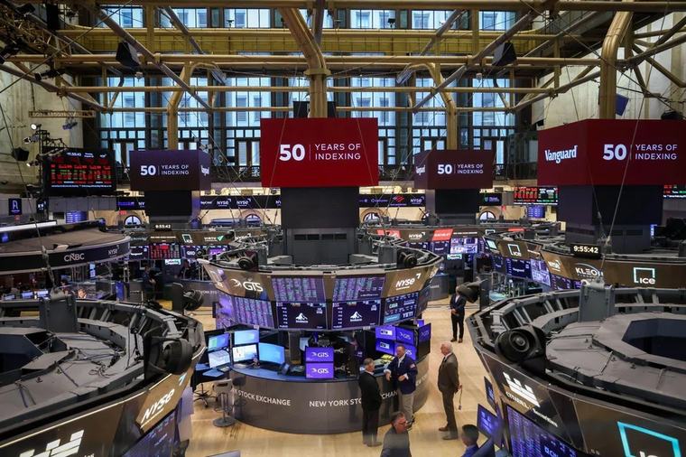 Wall St opens higher after Fed's Waller signals patience on rate policy