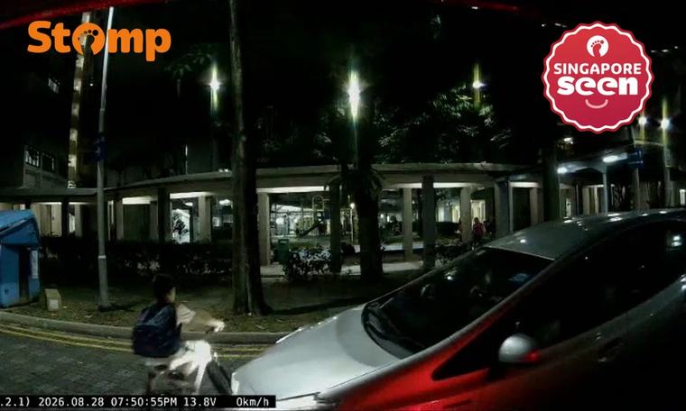 Stomper scolds kid ‘big time’ for cycling out into Sengkang road and nearly getting hit by car